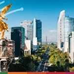 Angel of Independence monument in Mexico City, symbolising digital transformation in trade finance with modern buildings in the background