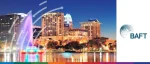 BAFT logo beside a twilight view of the Orlando skyline featuring illuminated skyscrapers and the Lake Eola fountain.