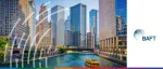 BAFT logo beside a daytime view of a city river with a yellow tour boat passing modern skyscrapers.