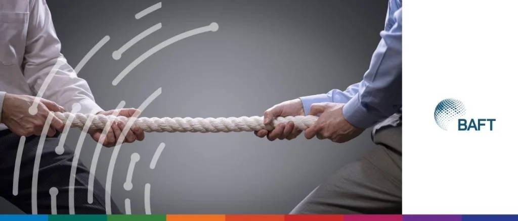 Global banking leaders at the 2025 BAFT Global Annual Meeting in Washington, DC, discussing the 'tug-of-war' between supply chain localization and cross-border collaboration in trade finance.