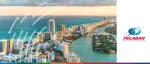 Sunset aerial view of the Miami beachfront and coastal waterways for the 59th FELABAN Annual Assembly organized by the Federation of Latin American Banks.