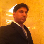 Professional portrait of a trade finance specialist in formal attire.