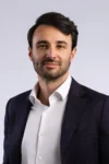 Professional man in business suit, representing trade finance expertise.