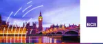 BCR logo beside a twilight view of Big Ben and the Palace of Westminster illuminated next to a bridge over the Thames.