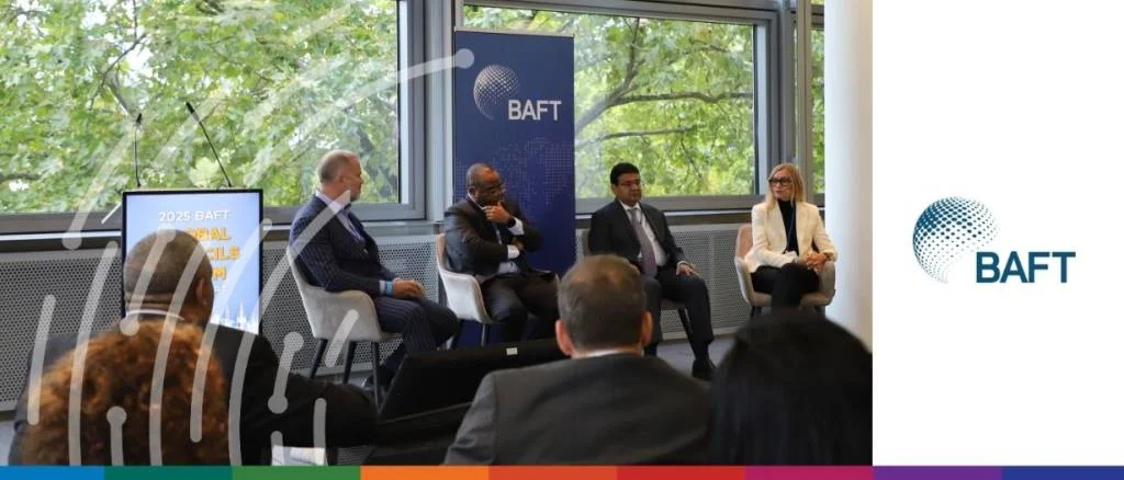 BAFT panel discussion on banking in an uncertain world and transactional finance, featuring four industry experts on stage at a 2025 conference.