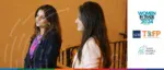 Carmen Ramirez and Neha Noronha speaking at the Women in Trade 2024 event, featuring logos for ADB, TSCFP, and Trade Finance Global.
