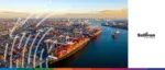Aerial view of a busy port with cargo ships and containers, highlighting trade and export activities.