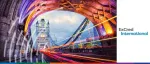 ExCred International event banner featuring an artistic long-exposure view of Tower Bridge in London.