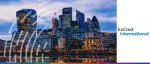 ExCred International event banner featuring the illuminated skyscrapers of London