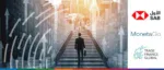 Professional climbing stairs to represent financial growth and trade finance partnerships with SAB and MonetaGo.