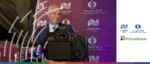 EBRD representative speaking at a London 2025 event with PrivatBank and European Bank for Reconstruction and Development logos.