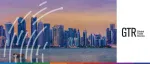 GTR logo next to a twilight view of the Doha, Qatar skyline across the water, featuring modern skyscrapers and a traditional dhow boat.