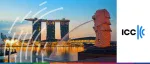 ICC logo beside the Merlion statue and Marina Bay Sands in Singapore at sunset.