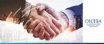 A close-up of two professionals shaking hands over a cityscape background, featuring the ICISA logo to represent the partnership between ICISA and AMAN UNION in boosting credit insurance initiatives.