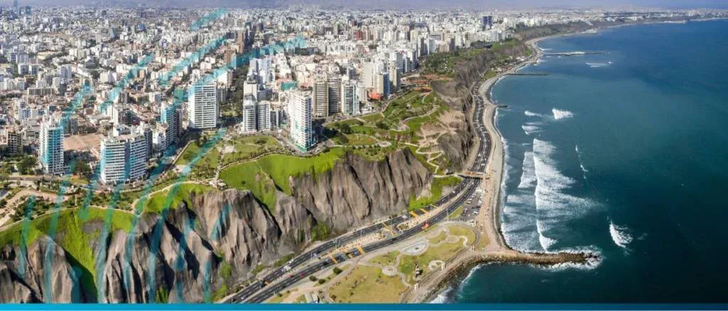 Panoramic view of the Lima, Peru coastline and cityscape, illustrating the IFC and JICA $400m green finance package for BBVA Peru.