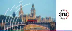Daytime view of a red double-decker bus crossing Lambeth Bridge with the Houses of Parliament and Big Ben in the background for the ITFA DNI Seminar on MLETR and digital trade flows.