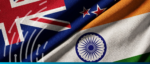 India and New Zealand flags during signing of free trade agreement.