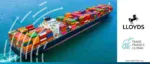 A large cargo ship carrying rows of shipping containers across the ocean, featuring the Lloyds Bank and Trade Finance Global logos to represent the first WaveBL electronic Bill of Lading transaction.