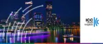 Night view of the illuminated Canary Wharf financial district skyline in London, reflecting in the River Thames, for the ICC United Kingdom event on Making Trade Finance Cheaper and More Accessible.
