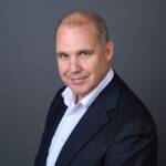 Professional businessman in suit for trade finance and global trade solutions.