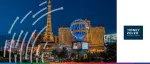 Money 20/20 USA event banner showcasing the iconic neon lights and architecture of the Las Vegas skyline at night.