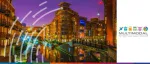 Night view of the Gas Street Basin in Birmingham featuring traditional canal narrowboats and illuminated modern apartments for the Multimodal 2025 exhibition.