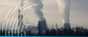 Industrial power plant emitting smoke and pollution into the sky.