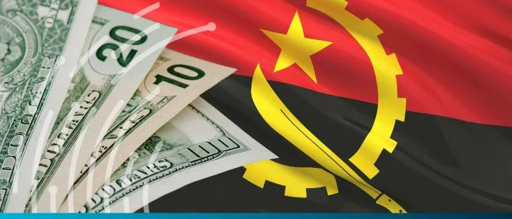 US dollar banknotes overlaid on the national flag of Angola, representing the country’s economic news and foreign exchange landscape.