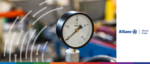 Close-up of a pressure gauge indicating financial stress levels for 2026.