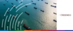 Aerial view of multiple cargo ships at sea, illustrating global shipping and trade risks.