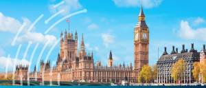 The Houses of Parliament and Big Ben in London under a bright blue sky, as Parliament debates a bill to double the UK Export Finance (UKEF) budget