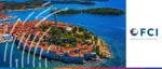 Aerial view of the coastal town of Rovinj, Croatia, with the St. Euphemia church tower on the Adriatic Sea, for the FCI Regional Conference on Factoring in CEE.