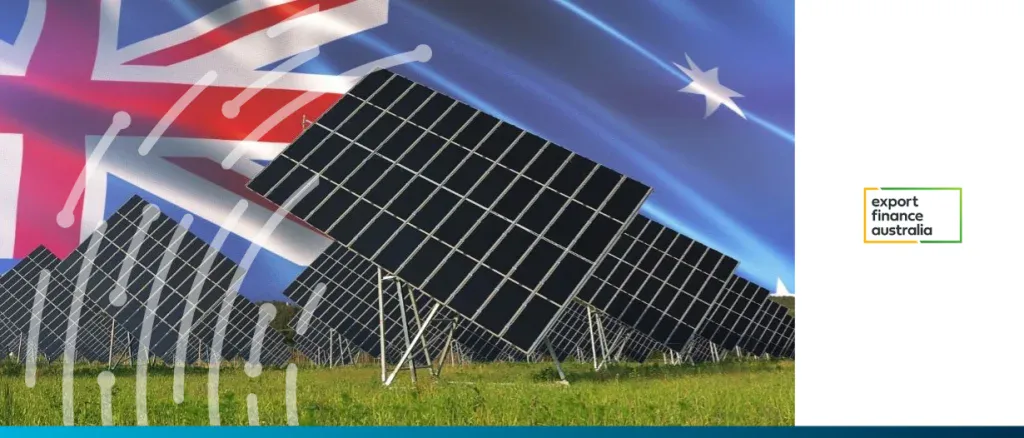Solar panels in a field with the Australian flag and Export Finance Australia logo, representing government support for renewable energy projects and sustainable trade finance.