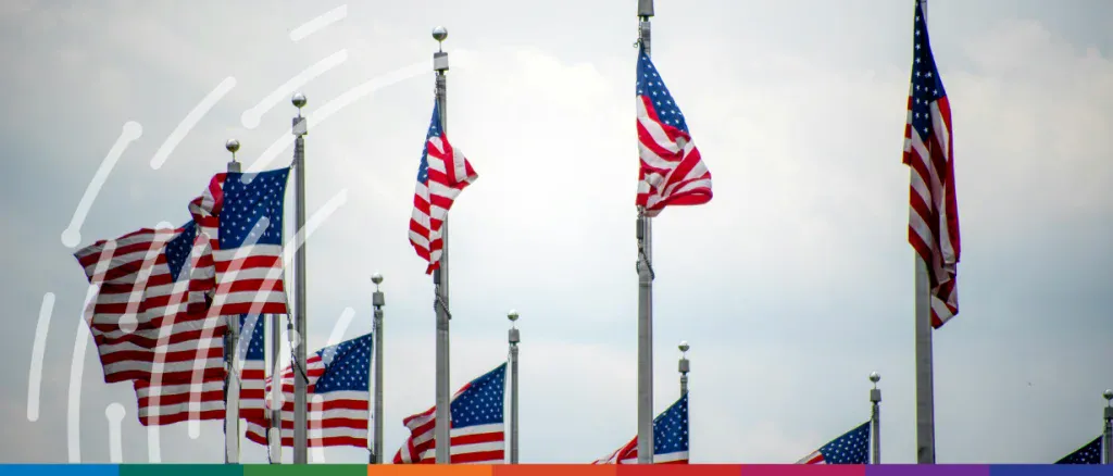 American flags flying outdoors, symbolising trade and international commerce.