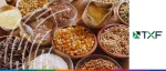 TXF logo next to various bowls and burlap sacks filled with grains, seeds, and legumes, representing the 2021 APAC Trade and Commodity Finance event.
