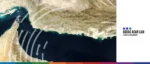 Aerial view of a strategic waterway impacting global trade and finance.
