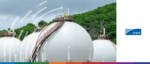 Oil storage tanks at a commodity forecast site, highlighting energy market analysis and trade financ.