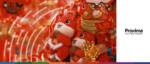 Festive Lunar New Year decorations with plush toys and red ornaments.