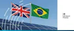 UK Export Finance (UKEF) CEO Tim Reid and Brazilian officials signing a reinsurance agreement at COP30 in Belém to support clean energy and infrastructure projects.