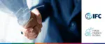 IFC and WTO 20th anniversary video banner on multilateral trade finance cooperation, featuring strategies to digitize supply chain finance and improve market access for low-income countries.