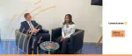 Two financial experts in a professional interview at Sibos Frankfurt, discussing emerging markets for Commerzbank.
