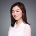 Professional woman smiling, representing trade finance expertise and global business solutions.